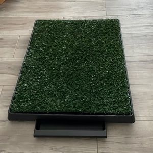 Dog artificial grass & pull out tray underneath Potty space.